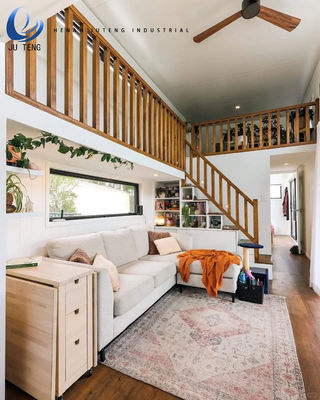 Casa de construção pré-fabricada de madeira com recipiente de aço